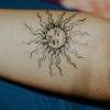 Tatouage soleil