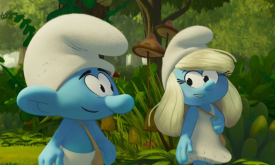 Scène du film Les Schtroumpfs 2025 – personnages animés Schtroumpf et Schtroumpfette dans la forêt