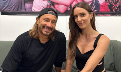 Bob Sinclar et Ellen assis sur un canapé dans les coulisses du Paléo Festival.